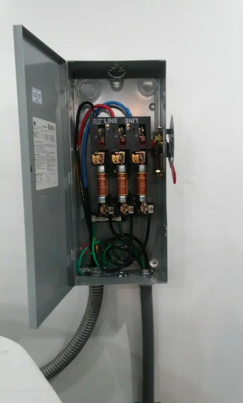 Three-phase disconnect switch installed for Smoke Detector Installation in Ormond Beach